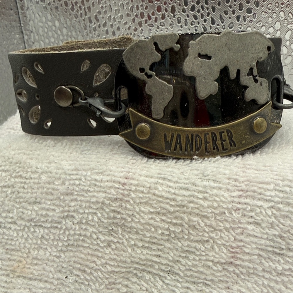 Leather  bracelet “ Wander” on front.  Black and Gold- tone World Map Bracelet